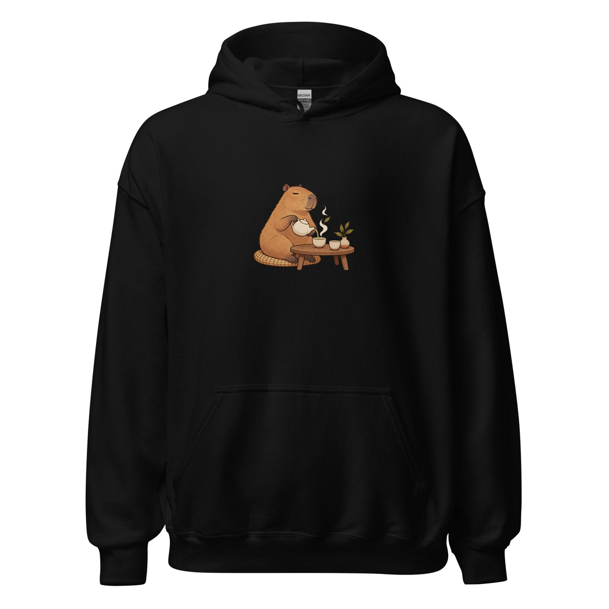 Black pullover hoodie with a tea-drinking animal beside a small table illustration