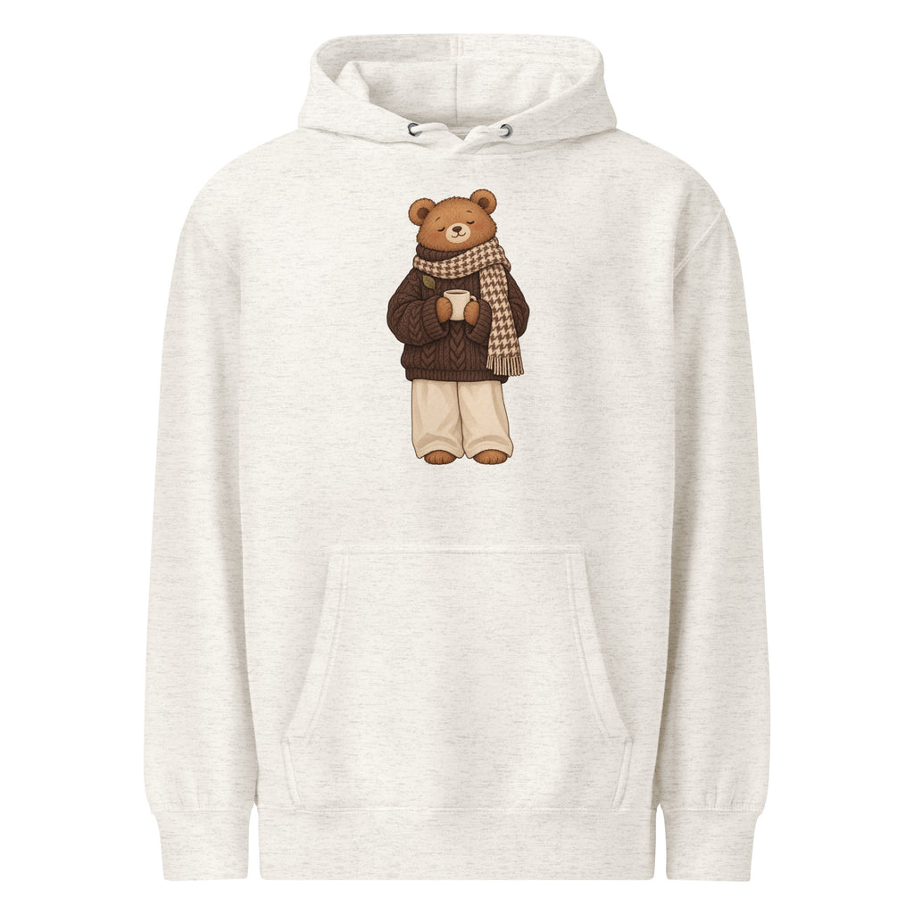 Oatmeal heather hoodie front with a brown bear in a checked scarf holding a mug