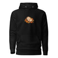 Black pullover hoodie with a hedgehog nestled among autumn leaves