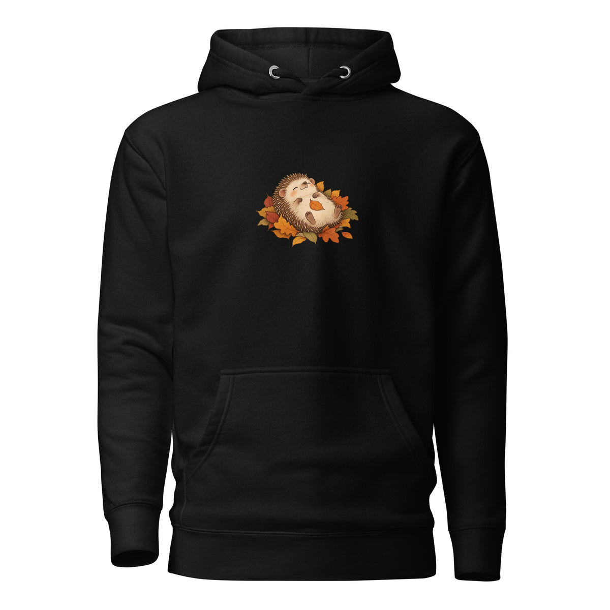 Black pullover hoodie with a hedgehog nestled among autumn leaves